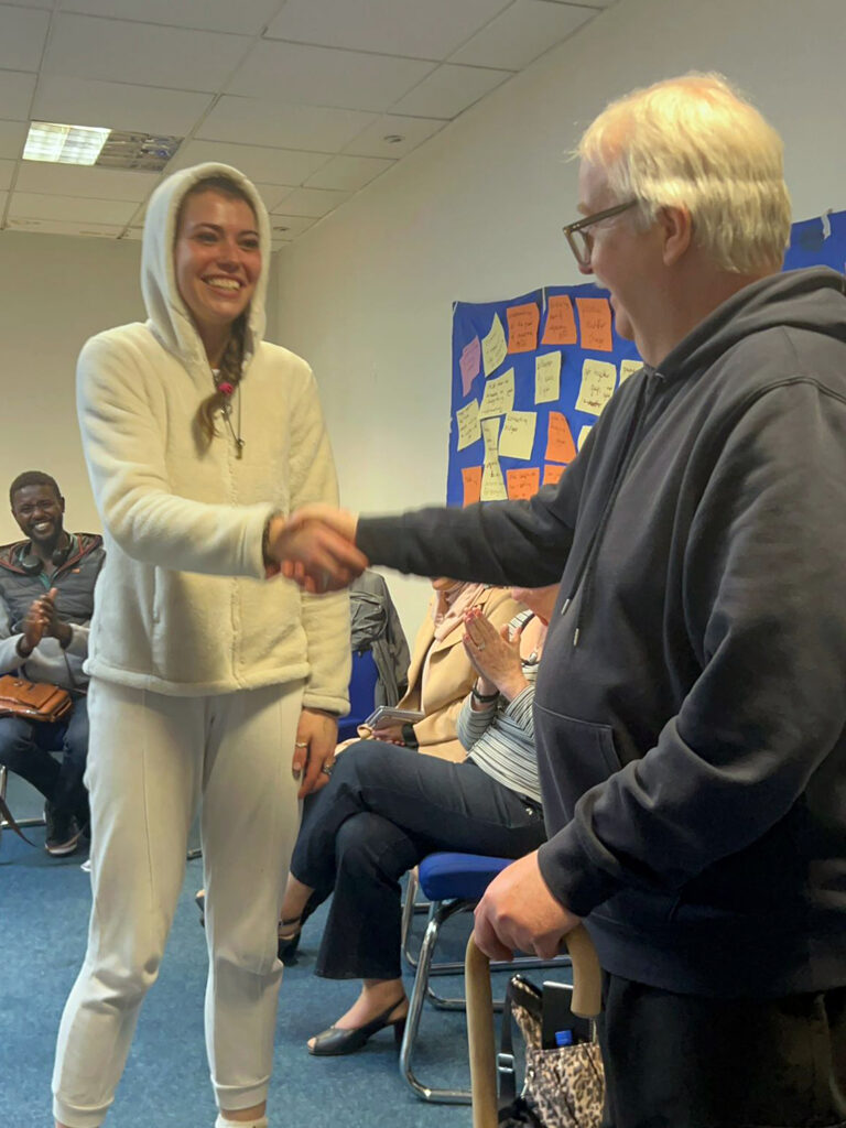 Participants greeting eachother